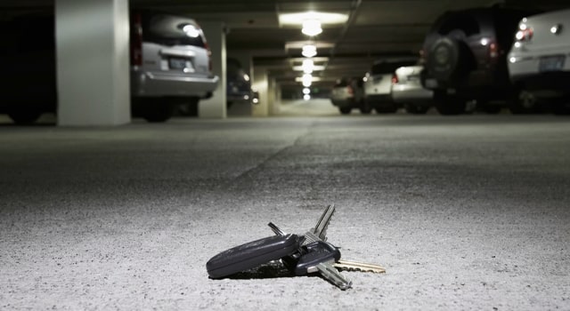 Lost keys of a car covered by insurance on the ground